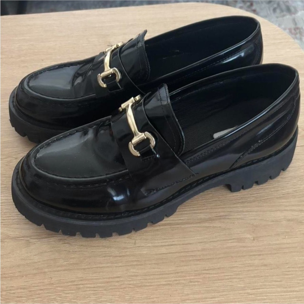 Steve Madden Black Landon Loafers with Gold Accent